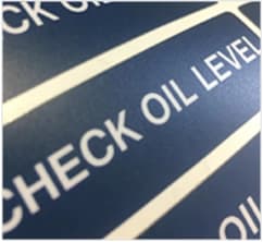 Laminated label with bold white copy on a dark blue background