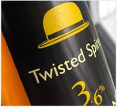 Black label with glossy spot varnish on a yellow icon and brand type